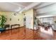 Open living area with hardwood floors, neutral walls, and lots of natural light at 147 Cervantes St, Las Vegas, NV 89101