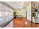 Open living area with hardwood floors and access to the kitchen and hall at 147 Cervantes St, Las Vegas, NV 89101