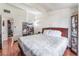 Bright bedroom with a large bed, wood floors, and a spacious closet at 147 Cervantes St, Las Vegas, NV 89101