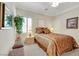 Bedroom with neutral-toned walls, carpeted floors, and shuttered windows at 2244 Shadow Canyon Dr, Henderson, NV 89044