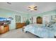 Comfortable bedroom with a ceiling fan and carpeted floors at 2244 Shadow Canyon Dr, Henderson, NV 89044