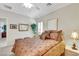 Bedroom with neutral-toned walls, carpeted floors, and shuttered windows at 2244 Shadow Canyon Dr, Henderson, NV 89044