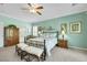 Relaxing main bedroom features a decorative ceiling fan and slider access to outdoor patio at 2244 Shadow Canyon Dr, Henderson, NV 89044