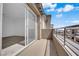 This outdoor balcony is adjacent to a bright bedroom with sliding glass door at 2536 Vandra St, Las Vegas, NV 89138