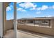 This outdoor balcony features views of the neighborhood with blue skies in the background at 2536 Vandra St, Las Vegas, NV 89138