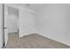 Clean bedroom with carpeted floors, closet with sliding doors, and a view of the hallway at 2536 Vandra St, Las Vegas, NV 89138