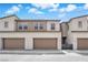 Exterior shot of home featuring attached garages, and neutral facade at 2536 Vandra St, Las Vegas, NV 89138