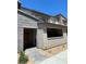 Modern townhome featuring a stylish stone facade and a covered entry at 2536 Vandra St, Las Vegas, NV 89138