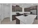 Contemporary kitchen featuring stainless steel appliances and a large kitchen island at 2536 Vandra St, Las Vegas, NV 89138