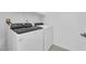 Functional laundry room with modern Whirlpool washer and dryer, featuring clean, white walls at 2536 Vandra St, Las Vegas, NV 89138