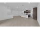 Expansive open concept living space features a modern kitchen with island and recessed lighting at 2536 Vandra St, Las Vegas, NV 89138
