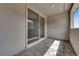 An enclosed patio with brick pavers offers a private, cozy spot with sliding door access to the home at 2536 Vandra St, Las Vegas, NV 89138