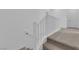 Staircase featuring carpeted steps and white railing, leading to the upper level at 2536 Vandra St, Las Vegas, NV 89138