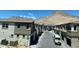Exterior view of a neighborhood street and townhomes in the community at 2536 Vandra St, Las Vegas, NV 89138