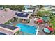 Aerial view of a backyard with a pool, spa, lounge area, and covered patio at 2822 Ashby Ave, Las Vegas, NV 89102