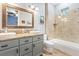Beautifully designed bathroom with double sinks and a tiled shower and tub combo at 2822 Ashby Ave, Las Vegas, NV 89102