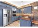 Well-appointed kitchenette featuring stainless steel appliances and granite countertops at 2822 Ashby Ave, Las Vegas, NV 89102