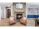 Cozy living room showcases a stone fireplace and decorative accents at 2822 Ashby Ave, Las Vegas, NV 89102