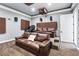 Home theater with tiered seating, comfortable seating and state-of-the-art projector system at 2822 Ashby Ave, Las Vegas, NV 89102
