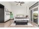 Bedroom featuring a ceiling fan, sliding glass doors and modern decor at 286 Fairmeadow St, Henderson, NV 89012