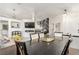 Spacious dining area with stylish chandelier, tile floors and decor accents at 286 Fairmeadow St, Henderson, NV 89012