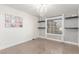Bright dining room with modern chandelier, monochrome patterned wallpaper and decor accents at 286 Fairmeadow St, Henderson, NV 89012