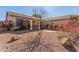 Inviting front yard with low-maintenance desert landscaping and mature trees at 286 Fairmeadow St, Henderson, NV 89012