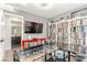 Bright office with modern desk, bookshelves, and comfortable seating, perfect for a home office at 286 Fairmeadow St, Henderson, NV 89012