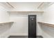 Spacious walk-in closet features custom shelving providing ample storage space for all your belongings at 286 Fairmeadow St, Henderson, NV 89012