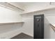 Ample storage in this walk-in closet is enhanced by natural wood trim at 286 Fairmeadow St, Henderson, NV 89012