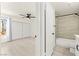 Well-lit bedroom with stylish sliding door closet, and tiled bathroom with black fixtures at 3150 Soft Breezes Dr # 1037, Las Vegas, NV 89128