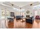 Well-lit clubhouse featuring a fireplace, multiple seating areas, and large windows with views of the pool at 3150 Soft Breezes Dr # 1037, Las Vegas, NV 89128