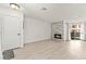 Open living room features stylish fireplace, light colored flooring, and modern finishes at 3150 Soft Breezes Dr # 1037, Las Vegas, NV 89128