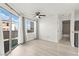 Bright living room with sliding glass doors offering lots of natural light and neighborhood views at 3150 Soft Breezes Dr # 1037, Las Vegas, NV 89128