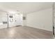 Bright living room with front entry, modern floors, and lots of natural light at 3150 Soft Breezes Dr # 1037, Las Vegas, NV 89128