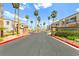 Street view of the Mar-A-Lago community entrance with palm trees and well-maintained landscaping at 3150 Soft Breezes Dr # 1037, Las Vegas, NV 89128