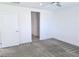 A modern bedroom featuring a ceiling fan, and doorway to the bathroom at 3210 Centano Ave, Henderson, NV 89044