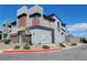 Modern two-story gray home with a garage, landscaping, and a Centano and Luminosa street sign at 3210 Centano Ave, Henderson, NV 89044