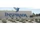 Inspiraada community sign with a blue hummingbird logo at 3210 Centano Ave, Henderson, NV 89044