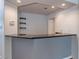 Contemporary bar area with granite countertops, sink, and stylish decor at 3633 Fox Heather Dr, Las Vegas, NV 89129