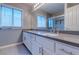 The bathroom features a double sink with updated fixtures and tiling at 3633 Fox Heather Dr, Las Vegas, NV 89129