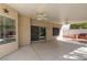 Spacious covered patio features ceiling fans and access to an outdoor grill area at 3633 Fox Heather Dr, Las Vegas, NV 89129
