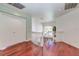 Open hallway with hardwood floors, natural light and decorative banister at 3633 Fox Heather Dr, Las Vegas, NV 89129