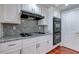 Efficient kitchen featuring gas cooktop, granite countertops, and modern appliances at 3633 Fox Heather Dr, Las Vegas, NV 89129