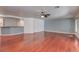 Spacious living room with hardwood floors, recessed lights and ceiling fan at 3633 Fox Heather Dr, Las Vegas, NV 89129