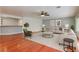 Spacious living room features stylish decor, hardwood floors, and ample natural light at 3633 Fox Heather Dr, Las Vegas, NV 89129