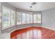 Bright room featuring hardwood floors, light gray walls, recessed lighting and many windows at 3633 Fox Heather Dr, Las Vegas, NV 89129