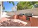 Built-in outdoor grill area with counter space, ideal for summer barbecues and outdoor cooking at 3633 Fox Heather Dr, Las Vegas, NV 89129
