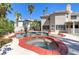 Backyard pool and spa surrounded by mature landscaping, perfect for relaxing and entertaining at 3633 Fox Heather Dr, Las Vegas, NV 89129