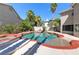 Backyard pool and spa area with steps, offering a refreshing escape at 3633 Fox Heather Dr, Las Vegas, NV 89129